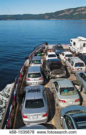Stock Photo - view from a ferry toward Galiano Island, British Columbia, Canada. Fotosearch
