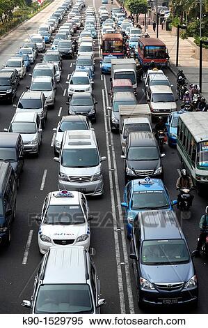 Stock Photography - View from above with traffic jam on Jalan Sudirman, Jakarta, Java, Indonesia, Southeast Asia. Fotosearch