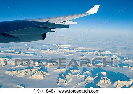 View from aircraft window View Large Photo Image Stock Photo - View from aircraft window. Fotosearch