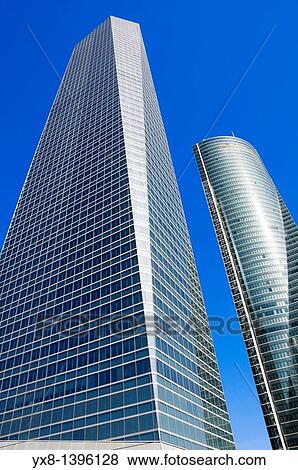 View from below of Crystal Tower and Espacio Tower located in Cuatro Torres Business Area of Madrid, Comunidad de Madrid, Spain, Europe View Large Photo Image Stock Photo - View from below of Crystal Tower and Espacio Tower located in Cuatro Torres Business Area of Madrid, Comunidad de Madrid, Spain, Europe. Fotosearch