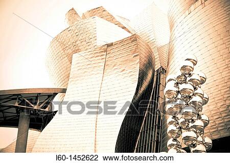 View from below of Tall tree and the eyeo sculpture by Anish Kapoor and Guggenheim Museum, Bilbao, Vizcaya, Basque Country, Spain View Large Photo Image Stock Image - View from below of Tall tree and the eyeo sculpture by Anish Kapoor and Guggenheim Museum, Bilbao, Vizcaya, Basque Country, Spain. Fotosearch