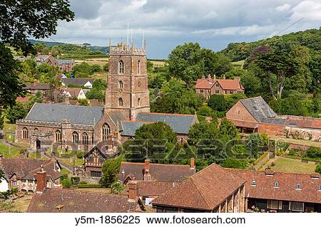View from Castle Dunster over village of Dunster, Exmoor National Park, Somerset, England, UK, Europe View Large Photo Image Stock Photography - View from Castle Dunster over village of Dunster, Exmoor National Park, Somerset, England, UK, Europe. Fotosearch