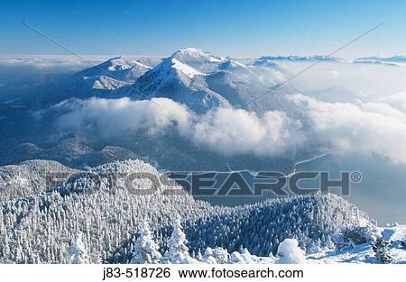 Stock Photograph - View from Herzogstand towards lake Walchen and Wetterstein. Karwendel range Bavarian Alps. Bavaria, Germany. Fotosearch