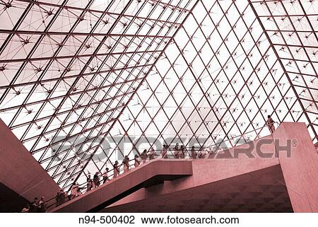 Stock Image - View from inside of the Louvre pyramid. Paris, France. Fotosearch