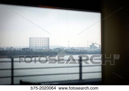 View from Thames River of the industrial zone in the North Docks Greenwich, Greenwich Peninsula, London. View Large Photo Image Picture - View from Thames River of the industrial zone in the North Docks Greenwich, Greenwich Peninsula, London.. Fotosearch