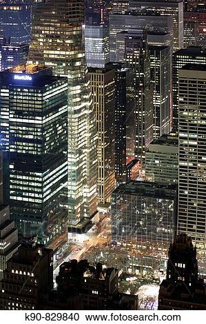 View from the Empire State Building to the buildings of Sixth Avenue and the Bryant Park at night, Manhattan, New York City, North America View Large Photo Image Stock Image - View from the Empire State Building to the buildings of Sixth Avenue and the Bryant Park at night, Manhattan, New York City, North America. Fotosearch