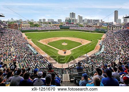 View from upper deck behind home plate of Chicago Cubs vs Sox at Wrigley Field in a cross-town classic View Large Photo Image Stock Image - View from upper deck behind home plate of Chicago Cubs vs Sox at Wrigley Field in a cross-town classic. Fotosearch