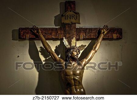 Stock Photo - View of a cross in the Almudena cathedral, madrid, Spain.. Fotosearch