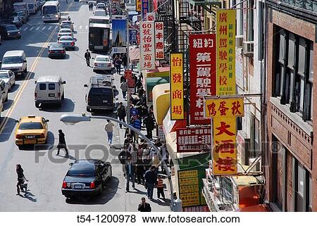 View of a street in New York Chinatown View Large Photo Image Stock Photo - View of a street in New York Chinatown. Fotosearch