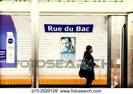 view of a unrecognizable woman walking down the platform of the subway station Rue du Bac, Paris View Large Photo Image Stock Photo - view of a unrecognizable woman walking down the platform of the subway station Rue du Bac, Paris. Fotosearch