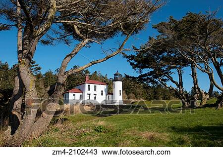 Stock Image - View of Admiralty Head Lighthouse at Fort Casey State Park on Whidbey Island, Washington State, United States.. Fotosearch