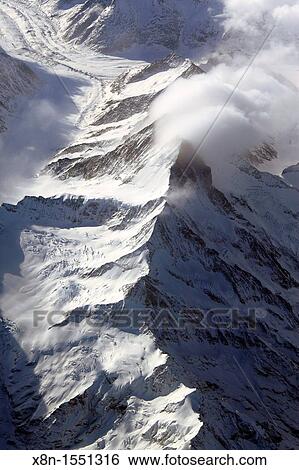 View of Alps mountains from air plane View Large Photo Image Stock Photograph - View of Alps mountains from air plane. Fotosearch