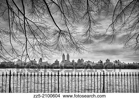 View of Apartments on Central Park West from across the central park resevour. View Large Photo Image Picture - View of Apartments on Central Park West from across the central park resevour.. Fotosearch