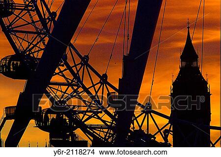 Picture - View of Big Ben as seen through the London Eye, against a dramatic Winter sunset.. Fotosearch