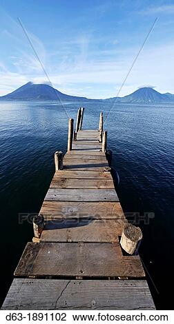 Stock Image - View of boat jettiy, Panajachel, early morning. Fotosearch