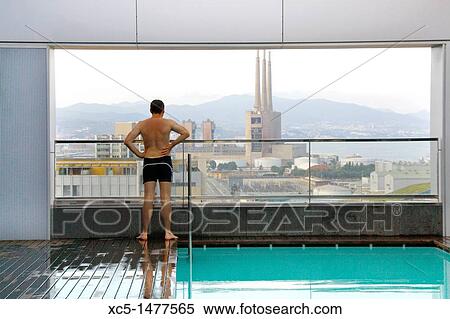 Stock Photography - View of buildings in San Adria de Besos from the pool floor in a hotel, Barcelona, Catalonia, Spain. Fotosearch