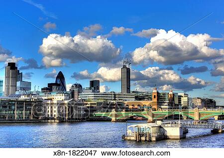 Stock Photo - View of city from Millennium Bridge, London, UK. Fotosearch