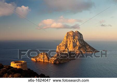View of Es Vedr? and Es Vedranell islots from the watchtower of Torre des Savinar in the south of Ibiza, Sant Josep de Sa Talaia, Ibiza, Illes Balears, Spain View Large Photo Image Stock Photo - View of Es Vedr? and Es Vedranell islots from the watchtower of Torre des Savinar in the south of Ibiza, Sant Josep de Sa Talaia, Ibiza, Illes Balears, Spain. Fotosearch