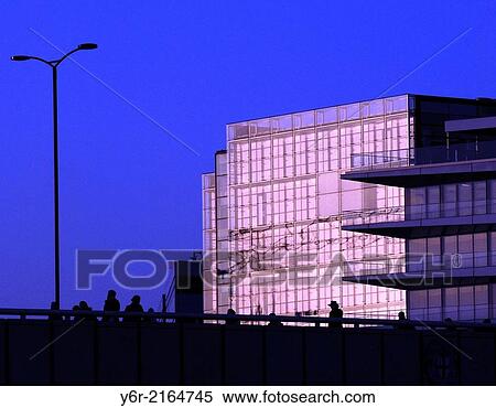 View of London Bridge and City of London office building lit up by late-evening light in London, England. View Large Photo Image Stock Photography - View of London Bridge and City of London office building lit up by late-evening light in London, England.. Fotosearch