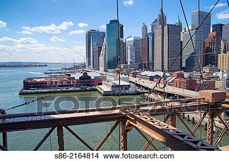 View of Lower Manhattan and the Wall Street Financial District, from the Brooklyn Bridge, New York City. View Large Photo Image Picture - View of Lower Manhattan and the Wall Street Financial District, from the Brooklyn Bridge, New York City.. Fotosearch