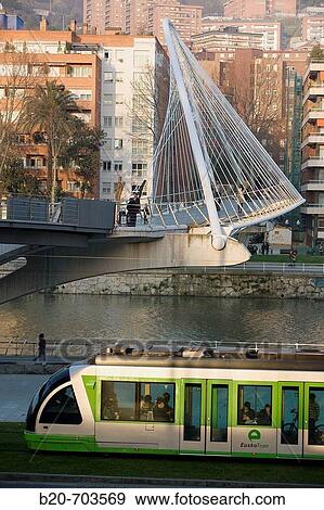 View of? Pasarela de Uribitarte? bridge, also called? Zubi-Zuri? (means white bridge in Basque), designed by Santiago Calatrava. Bilbao. Basque Country. Spain View Large Photo Image Stock Photo - View of? Pasarela de Uribitarte? bridge, also called? Zubi-Zuri? (means white bridge in Basque), designed by Santiago Calatrava. Bilbao. Basque Country. Spain. Fotosearch