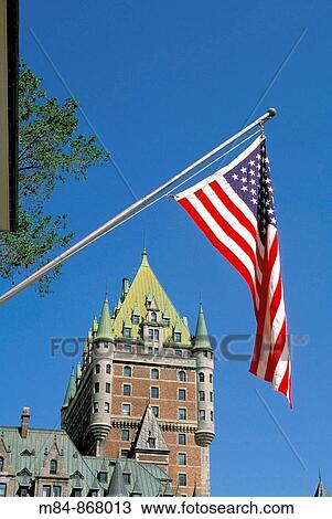 View of the Chateau Frontenac framed by the American flag, Quebec City, Quebec, Canada View Large Photo Image Stock Image - View of the Chateau Frontenac framed by the American flag, Quebec City, Quebec, Canada. Fotosearch