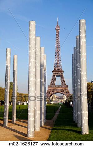 View of the Eiffel Tower, Tour Eiffel, Champ de Mars,? Les murs de la paix? artwork on Place Joffre, Paris, Ile de France, France, Europe View Large Photo Image Stock Photo - View of the Eiffel Tower, Tour Eiffel, Champ de Mars,? Les murs de la paix? artwork on Place Joffre, Paris, Ile de France, France, Europe. Fotosearch
