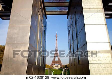 View of the Eiffel Tower, Tour Eiffel, Champ de Mars,? Les murs de la paix? artwork on Place Joffre, Paris, Ile de France, France, Europe View Large Photo Image Stock Photo - View of the Eiffel Tower, Tour Eiffel, Champ de Mars,? Les murs de la paix? artwork on Place Joffre, Paris, Ile de France, France, Europe. Fotosearch