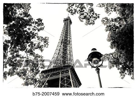 View of the Eiffel Tower with trees and a lamppost in Paris, France, Europe View Large Photo Image Stock Photo - View of the Eiffel Tower with trees and a lamppost in Paris, France, Europe. Fotosearch
