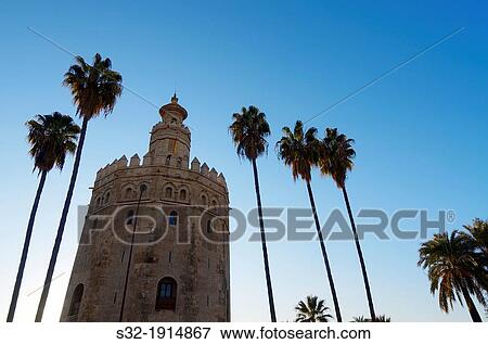 view of the famous Gold Tower, Seville, Andalucia, Spain View Large Photo Image Stock Photo - view of the famous Gold Tower, Seville, Andalucia, Spain. Fotosearch