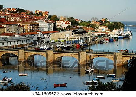 View of the ria and town of San Vicente de la Barquera, Cantabria, Spain View Large Photo Image Stock Image - View of the ria and town of San Vicente de la Barquera, Cantabria, Spain. Fotosearch