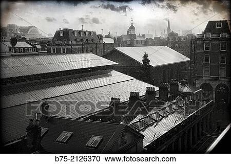 Stock Image - View of the Roofs from the terrace of the Royal Opera House in Covent Garden, London, England, UK, Europe.. Fotosearch