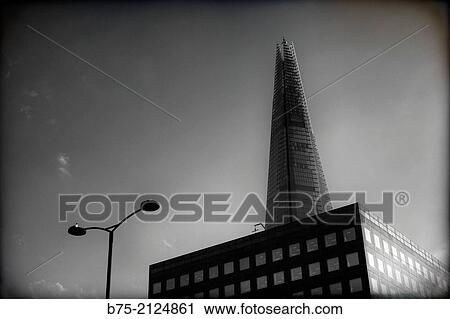 View of the Shard building from London Bridge in London, England, UK View Large Photo Image Stock Image - View of the Shard building from London Bridge in London, England, UK. Fotosearch