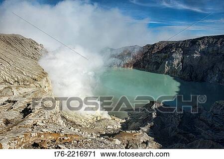 view of the smoking Kawah Ijen volcanic crater and lake, Java, Indonesia. View Large Photo Image Stock Image - view of the smoking Kawah Ijen volcanic crater and lake, Java, Indonesia.. Fotosearch