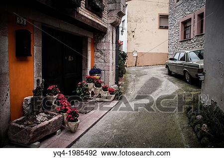 View of the streets of the town of Cue. Llanes, Asturias, Spain. View Large Photo Image Stock Image - View of the streets of the town of Cue. Llanes, Asturias, Spain.. Fotosearch