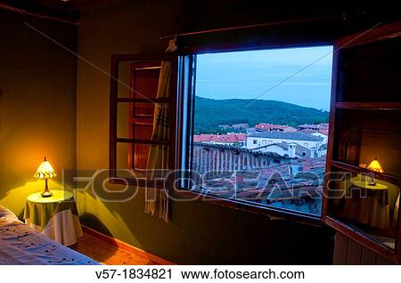 Stock Image - View of the village from a hotel window at dawn. Candelario, Salamanca province, Castilla Leon, Spain.. Fotosearch