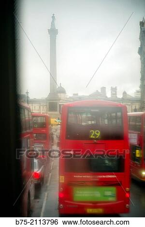 View of Trafalgar Square from a double decker bus and a bus in the foreground. London, England, UK, Europe. View Large Photo Image Stock Photograph - View of Trafalgar Square from a double decker bus and a bus in the foreground. London, England, UK, Europe.. Fotosearch