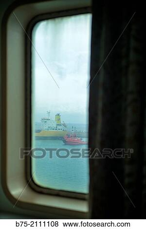View of two moored boats in Palma de Mallorca harbor through a window with curtains of a boat. In the Harbour of Palma de Mallorca, Balearic Islands, Spain, Mediterranean Sea View Large Photo Image Stock Photo - View of two moored boats in Palma de Mallorca harbor through a window with curtains of a boat. In the Harbour of Palma de Mallorca, Balearic Islands, Spain, Mediterranean Sea. Fotosearch