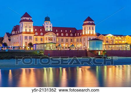 Stock Image - View over the Baltic Sea at night to the Kurhaus Binz. The Kurhaus Binz was opened on July 22, 1890. Today it is a luxury hotel on the Baltic Sea, Baltic resort Binz, Ruegen Island, County Vorpommern-Ruegen, Mecklenburg-Western Pomerania, Germany, Europe.. Fotosearch