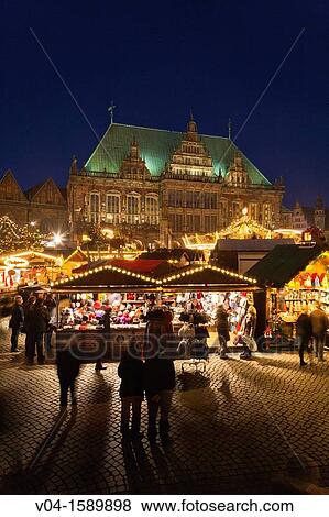 View over the christmas market and the historic town hall at dusk in Bremen, Germany, Europe View Large Photo Image Stock Photo - View over the christmas market and the historic town hall at dusk in Bremen, Germany, Europe. Fotosearch