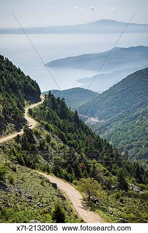 Stock Photography - View west, from the track crossing the Taygetus mountains above Saidona in the Outer Mani, Messinia, Southern Peloponnese, Greece.. Fotosearch