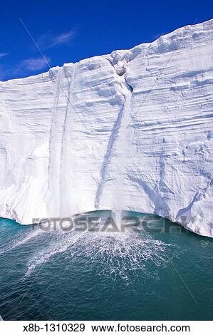 Views of Austfonna, an ice cap located on Nordaustlandet in the Svalbard archipelago in Norway View Large Photo Image Stock Photo - Views of Austfonna, an ice cap located on Nordaustlandet in the Svalbard archipelago in Norway. Fotosearch