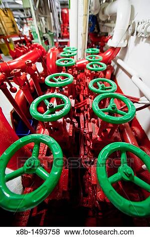 Stock Photo - Views of the engine room aboard the Lindblad Expeditions ship National Geographic Explorer. Fotosearch