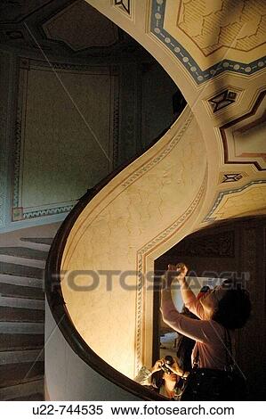 Vignola Modena, Italy, Asian tourists taking a photos at Palazzo Barozzi's winding staircase View Large Photo Image Stock Photography - Vignola Modena, Italy, Asian tourists taking a photos at Palazzo Barozzi's winding staircase. Fotosearch