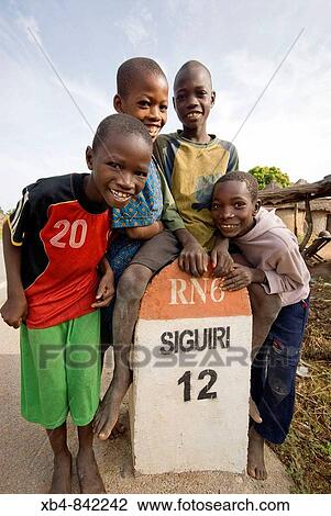 Village of Soumbarakoba on the River Niger shore, Siguiri, Republic of Guinea View Large Photo Image Stock Image - Village of Soumbarakoba on the River Niger shore, Siguiri, Republic of Guinea. Fotosearch