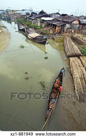 Village on river, Bandarban District, Bangladesh View Large Photo Image Stock Photo - Village on river, Bandarban District, Bangladesh. Fotosearch
