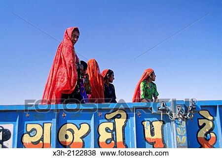 Stock Photo - villagers going with truck to Dhrang Fair, Kutch district, Gujarat, India, South Asia.. Fotosearch