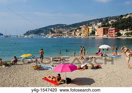 Villefranche sur Mer, the beach and holidaymakers, South of France View Large Photo Image Stock Image - Villefranche sur Mer, the beach and holidaymakers, South of France. Fotosearch