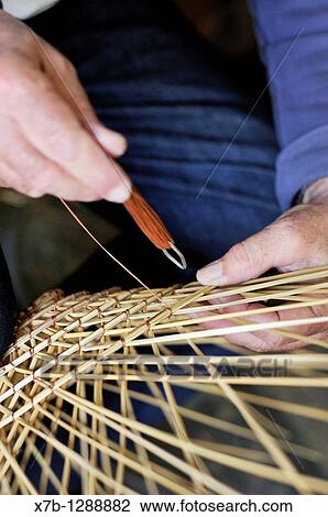 Vincenzo Abate in his workshop making traditional shrimp pots using rushes. Gallipoli, Apulia, Italy. View Large Photo Image Stock Image - Vincenzo Abate in his workshop making traditional shrimp pots using rushes. Gallipoli, Apulia, Italy.. Fotosearch