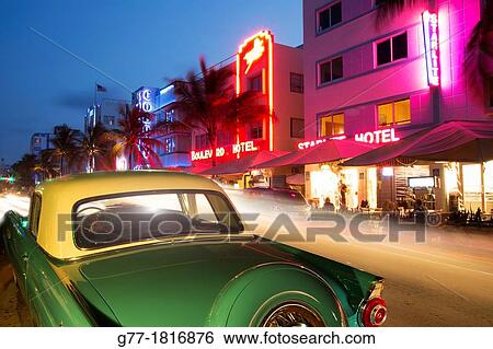 Stock Photograph - Vintage car in Ocean Drive, Miami Beach, Florida, USA. Fotosearch
